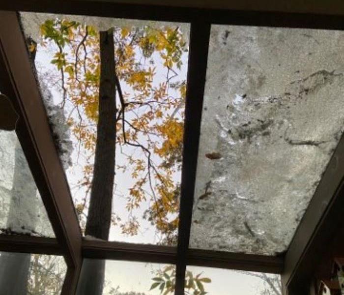 Broken window in sunroom in Louisville, TN
