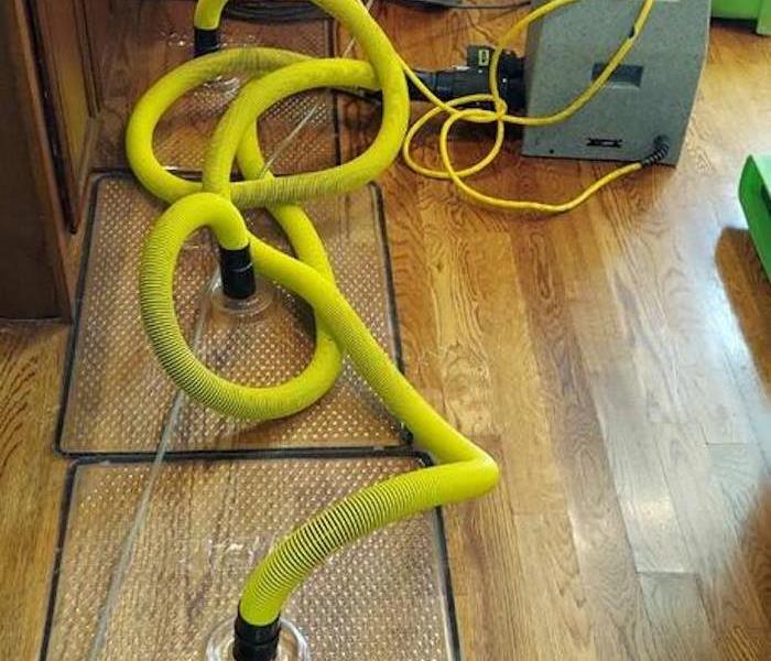 Floor Mats drying system being used on hardwood floor