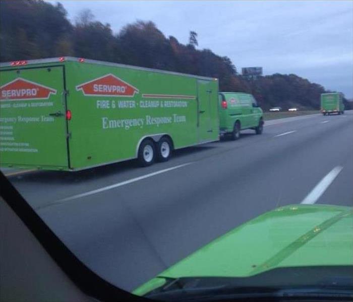 large Servpro trailer and vehicles driving on interstate