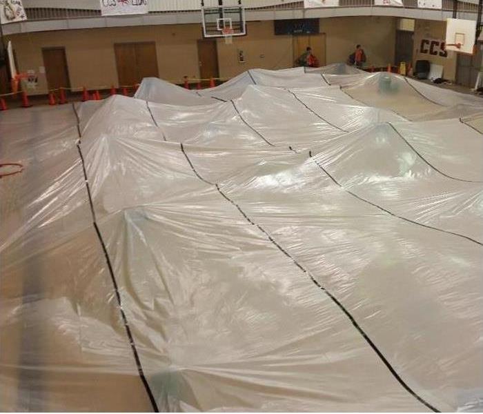 gym floor with drying tent set up
